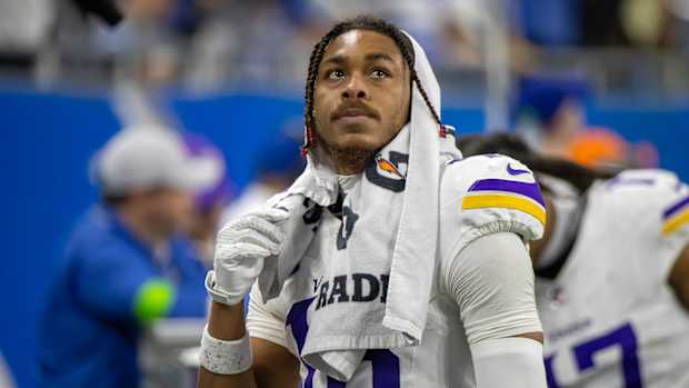 Minnesota Vikings wide receiver Justin Jefferson (18) looks at the big screen during second half of the game against the Detroit Lions at Ford Field.
